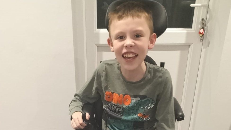 William using his electric wheelchair